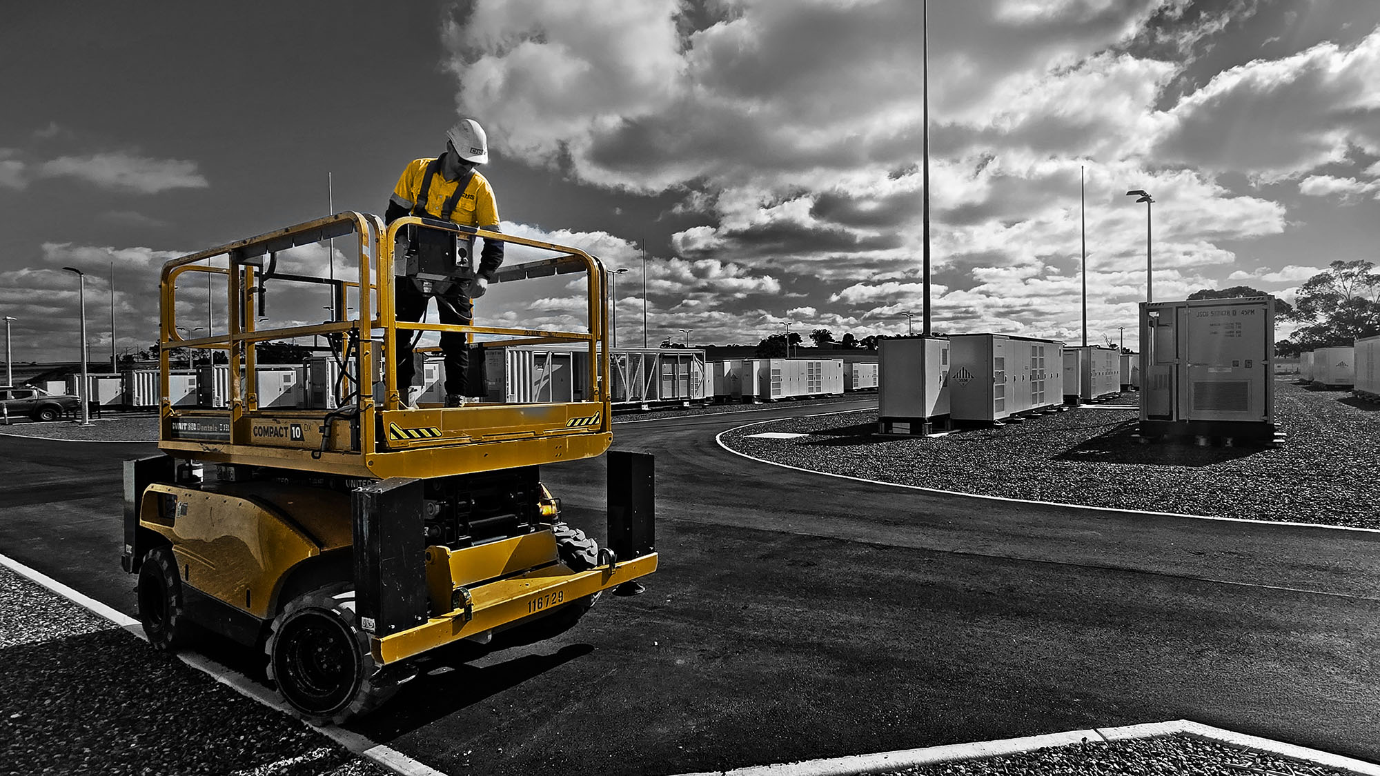 CHS technician on scissor lift at battery energy storage site Adelaide